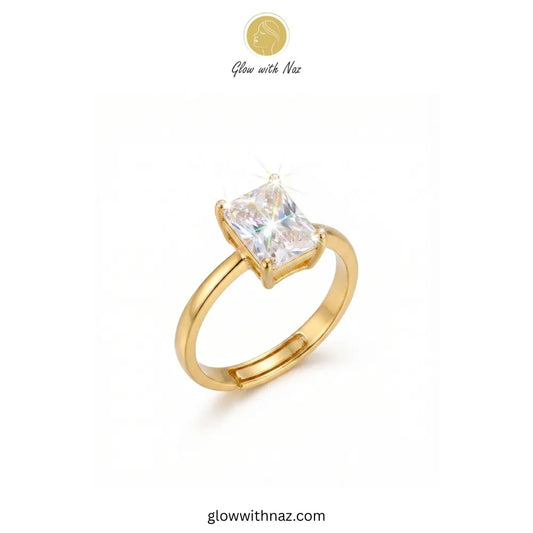 Golden radiant rectangle diamond ring sparkling on a white background ring, girls rings, rings for girls, rings simple, simple rings, stainless steel jewelry, jewellery set, aesthetic jewelry, simple jewellery, chain, jewelry, artificial jewellery
