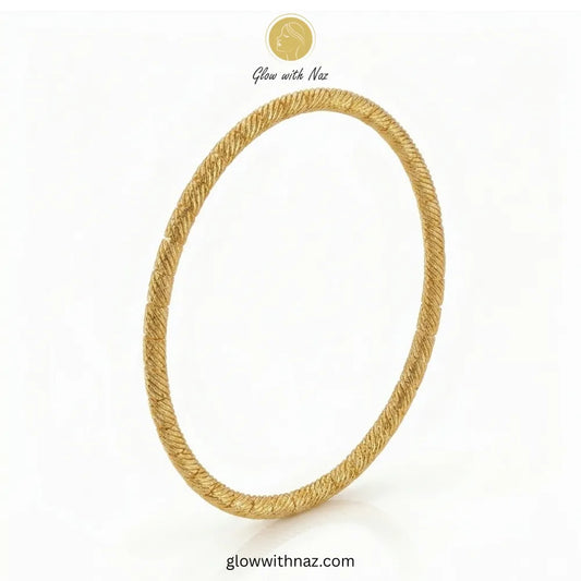 Textured twisted gold bangle by Glow with Naz