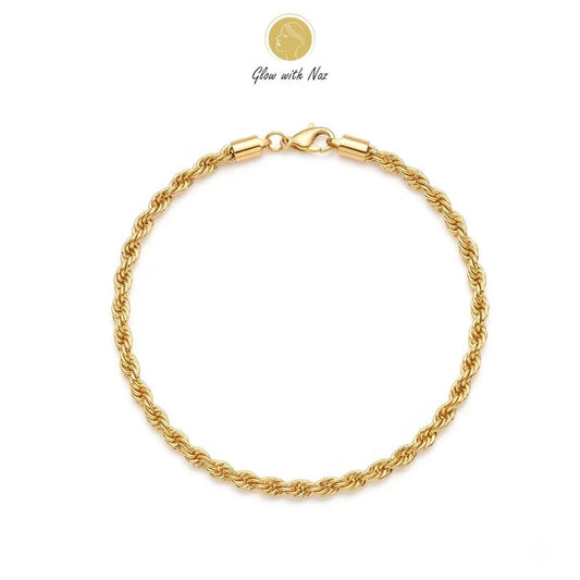 Anti-Tarnish Stunning Twisted Rope Bracelet for Women - Anti-Tarnish Stunning Twisted Rope Bracelet for WomenJewelryGlow With NazGlow With NazB0059B0059A close-up of a woman's wrist wearing the elegant Glow With Naz twisted rope golden bracelet against a minimalist aesthetic background