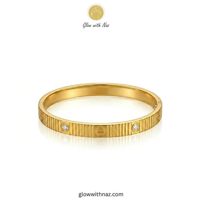 Bundle Offer: Textured Gold Hand Cuff Bracelet & Stainless Steel Hand Cuff Bracelet with Pave Accents - Bundle Offer: Textured Gold Hand Cuff Bracelet & Stainless Steel Hand Cuff Bracelet with Pave AccentsJewelryGlow With NazGlow With NazClose-up view of ribbed texture and stones on gold bangle