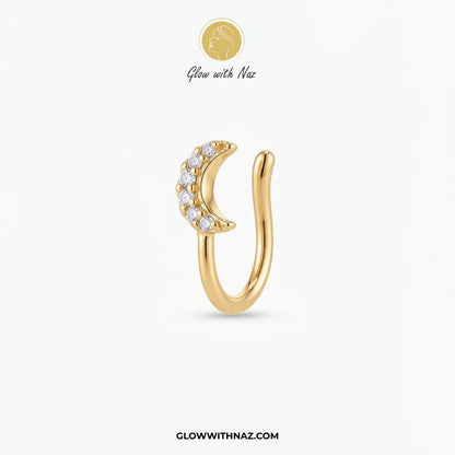 Gold non-pierced chutki crescent moon nose pin with clear zircon crystals on white background by Glow With Naz