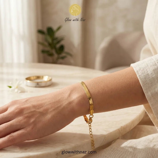 Elegant Gold-Plated Simple Stainless Steel Snake Chain Bracelet - Elegant Gold-Plated Simple Stainless Steel Snake Chain BraceletJewelryGlow With NazGlow With NazB0039B0039Close-up shot of gold herringbone bracelet clasp and texture details