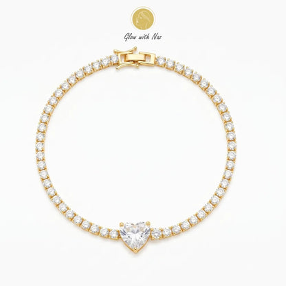 A stunning top-down view of the elegant Glow With Naz crystal heart golden chain bracelet