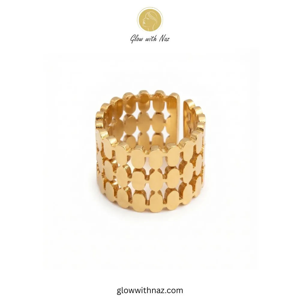Gold double zip stainless steel wide statement ring on white display tray by Glow With Naz