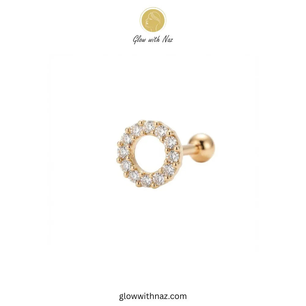 Gold hollow circle CZ stud worn on a helix cartilage ear piercing by Glow With Naz