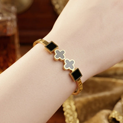 Gold plated stainless steel waterproof Black lucky clover bangle bracelet - Gold plated stainless steel waterproof Black lucky clover bangle braceletJewelryGlow with NazGlow With NazN-B005Gold plated stainless steel waterproof Black lucky clover bangle bracelet