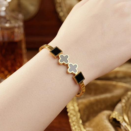 Gold plated stainless steel waterproof Black lucky clover bangle bracelet - Gold plated stainless steel waterproof Black lucky clover bangle braceletJewelryGlow with NazGlow With NazN-B005Gold plated stainless steel waterproof Black lucky clover bangle bracelet