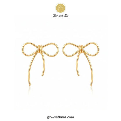 Gold Wire Sculpted Big Bow Stud Earrings - #Gold Wire Sculpted Big Bow Stud EarringsJewelryGlow With NazGlow With NazBig Bow EarringGold plated wire sculpted oversized big ribbon bow stud earrings with flowing tails by Glow With Naz#