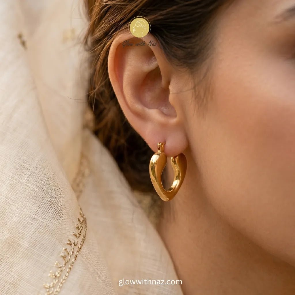 Heart Hoops 18K Gold Plated Earrings - Heart Hoops 18K Gold Plated EarringsJewelryGlow With NazGlow With NazN-E009N-E009Heart hoop earrings in 18k gold plated stainless steel