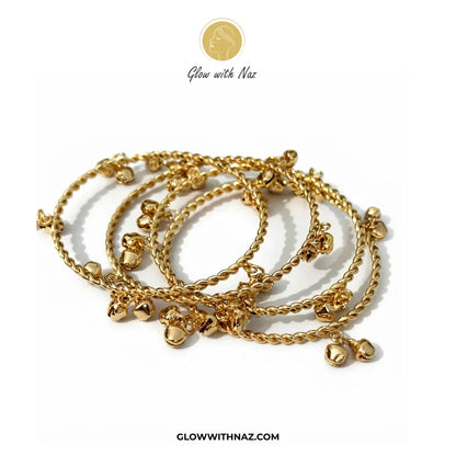 Gold Kashmiri ghungroo bell drop bangle set of 4 on white background by Glow With Naz
