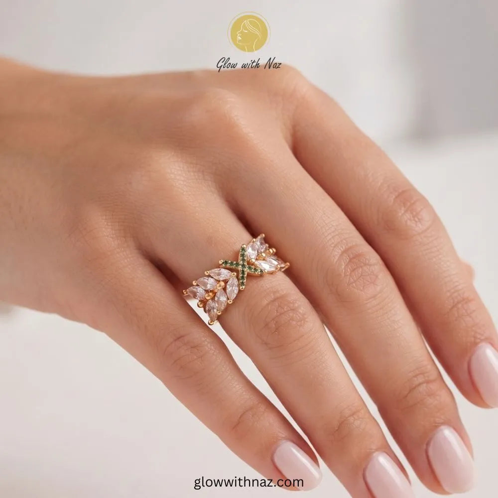 Marquise crystal green cross ring worn on finger model by Glow With Naz