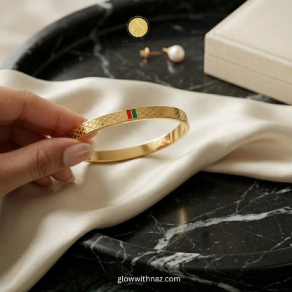 Nayab Red & Green Charm Gold Bangle Bracelet - Nayab Red & Green Charm Gold Bangle BraceletJewelryGlow With NazGlow With NazN-B017N-B017Nayab Red & Green Charm Gold Bangle Bracelet in Pakistan – Anti - Tarnish Pure Stainless Steel | Glow with Naz
