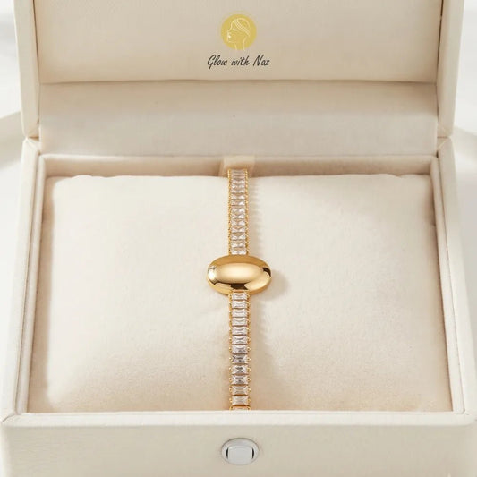 Premium Crystal Oval Gold Bracelet for Women - Premium Crystal Oval Gold Bracelet for WomenJewelryGlow With NazGlow With NazB0060B0060Detail shot of the stunning minimalist jewelry featuring sparkling crystals and a smooth gold centerpiece hand cuff bracelet, girls bracelet, bracelet for girls, simple bracelet, chain bracelet, bracelet chain, bracelet watch, hand bracelet, black jewellery, bracelet, ring bracelet, aesthetic bracelet, bracelet for women, bracelet set, cartier bracelet, cute brace