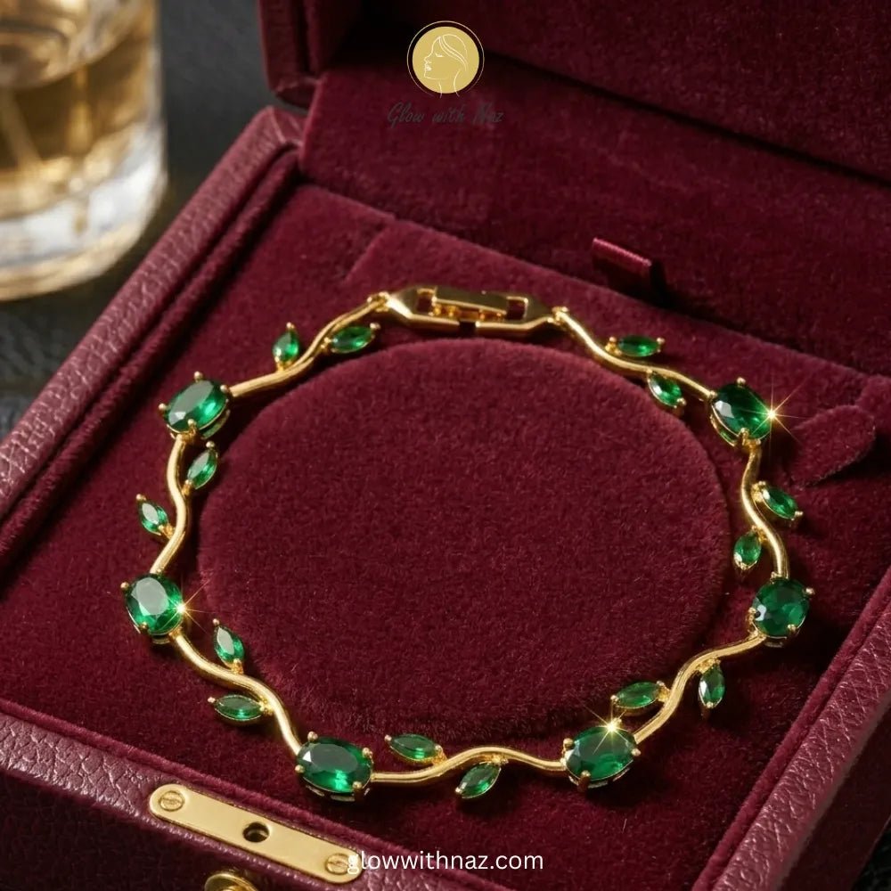 Premium Green Tulip Bracelet | Rapunzel Floral Stainless Steel Bracelet - Premium Green Tulip Bracelet | Rapunzel Floral Stainless Steel BraceletJewelryGlow With NazGlow With NazTB003AA gold bracelet with green gemstones arranged in a vine pattern, displayed inside a dark red velvet jewelry box. Tulip Rapunzel bracelet, floral tulip bracelet, Rapunzel inspired jewelry, aesthetic tulip bracelet, trendy charm bracelet, stainless steel tulip bracelet, gold plated flower bracelet, delicate floral wr