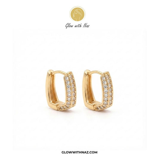Premium Small Crystal Zircon Square Hoop Earrings - Premium Small Crystal Zircon Square Hoop EarringsJewelryGlow With NazGlow With NazE037A pair of gold huggie hoop earrings with pavé-set clear stones, displayed on a clean white background with the brand logo 'Glow with Naz' at the top and the website 'GLOWWITHNAZ.COM' at the bottom. studs earrings, small earrings, girls earrings, simple earrings, earrings for girls, black earrings, earrings, ear rings, earrings tops, stud earrings, tops earring
