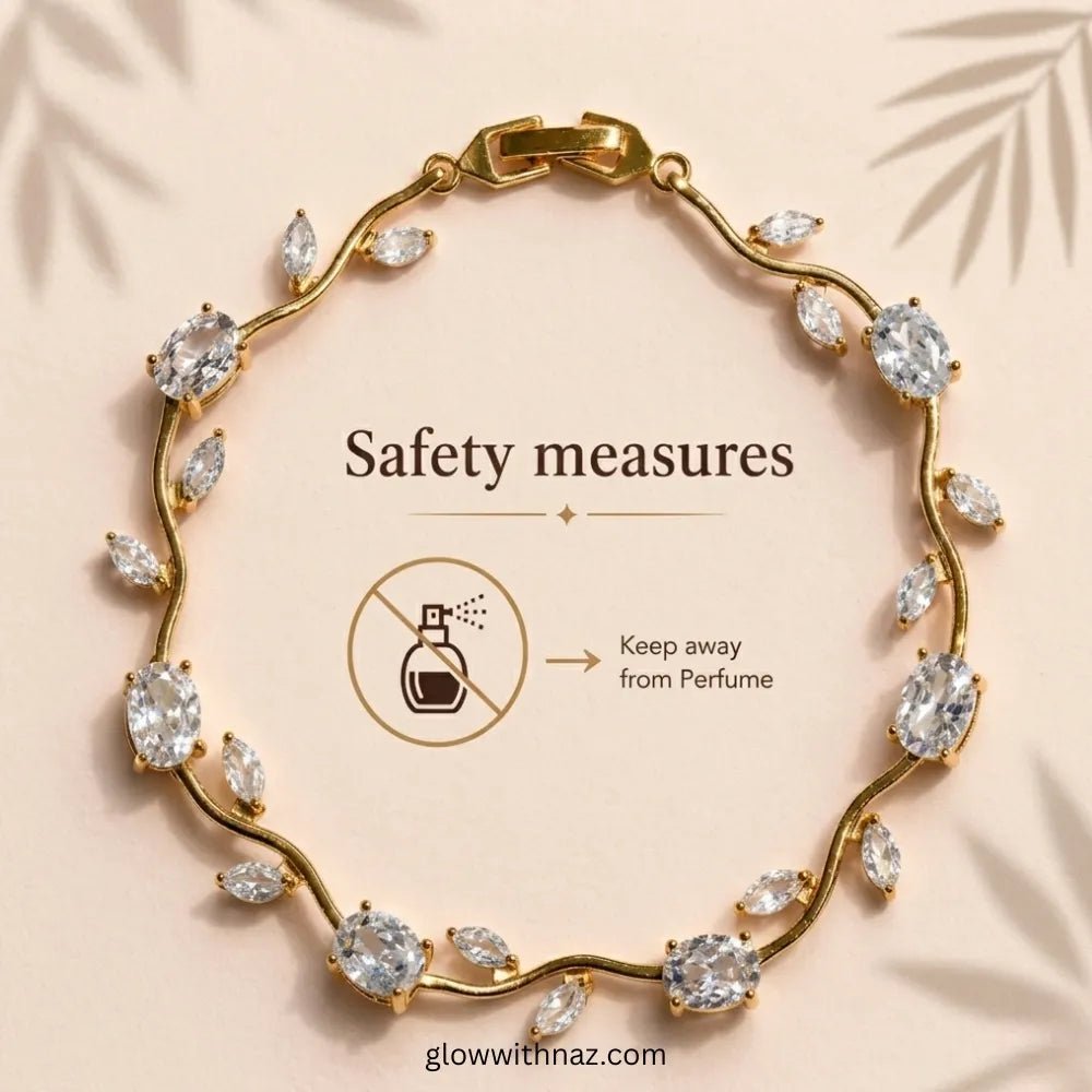 Premium White Tulip Bracelet | Rapunzel Floral Stainless Steel Bracelet - Premium White Tulip Bracelet | Rapunzel Floral Stainless Steel BraceletJewelryGlow With NazGlow With NazTB006AGold wavy bracelet with marquise and oval clear crystals, displayed on a beige background with text reading 'Safety measures' and a perfume prohibition icon. Tulip Rapunzel bracelet, floral tulip bracelet, Rapunzel inspired jewelry, aesthetic tulip bracelet, trendy charm bracelet, stainless steel tulip bracelet, go