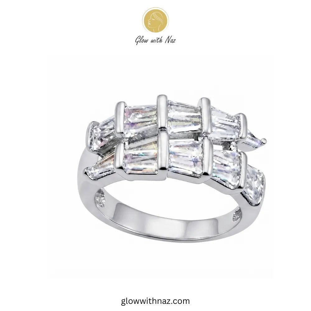 Radiant Adjustable Silver Arrow Diamond Ring - Radiant Adjustable Silver Arrow Diamond RingJewelryGlow With NazGlow With NazR028A silver-tone ring featuring a double row of baguette-cut clear stones with triangular marquise-cut stones on the sides, shown on a plain white background with Glow with Naz branding. ring, girls rings, rings for girls, rings simple, simple rings, stainless steel jewelry, jewellery set, aesthetic jewelry, simple jewellery, chain, jewelry, artificial jewellery