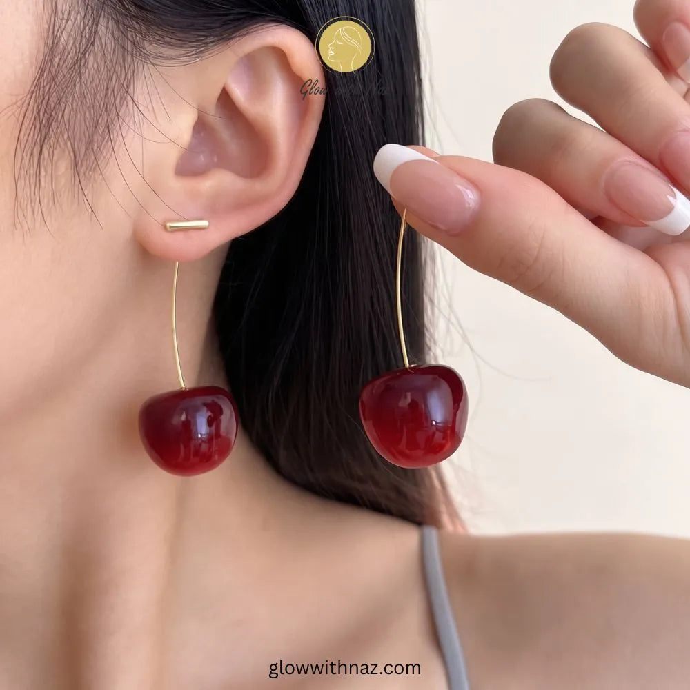 Gold bar stud earrings with long stem and deep red translucent resin glass cherry drops