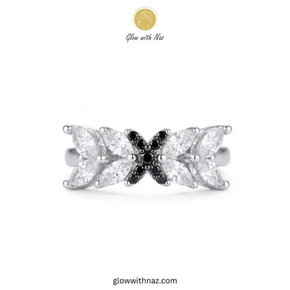 Silver marquise crystal statement ring with black pave cross emblem by Glow With Naz