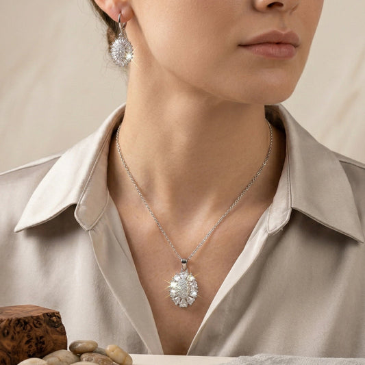 Silver Zirconia Necklace & Hoop Earrings Set - Silver Zirconia Necklace & Hoop Earrings SetJewelryGlow With NazGlow With NazN-N013N-N013Elegant silver - toned jewelry set featuring a sunburst pendant necklace and matching lever - back earrings with clear pavé crystals, displayed in a black velvet wooden gift box