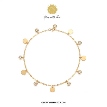 Stainless Steel Diamond Coin Anklet - Stainless Steel Diamond Coin AnkletJewelryGlow With NazGlow With NazA006A gold chain anklet with multiple round gold disc charms and several bezel-set clear stones, displayed on a clean white background with the brand logo 'Glow with Naz' above and 'GLOWWITHNAZ.COM' below.