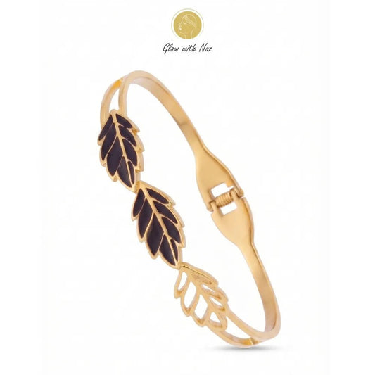 Stainless Steel Elegant 3 Leave Anti-Tarnish Hand Cuff Bracelet - Stainless Steel Elegant 3 Leave Anti-Tarnish Hand Cuff BraceletJewelryGlow With NazGlow With NazB0058B0058Close-up of the elegant stainless steel 3 leave hand cuff golden bracelet by Glow With Naz.