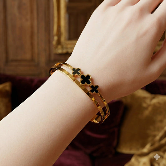 Stainless steel gold plated black four - leaf clover bangle - Stainless steel gold plated black four - leaf clover bangleJewelryGlow with NazGlow With NazN-B004Stainless steel gold plated black four - leaf clover bangle