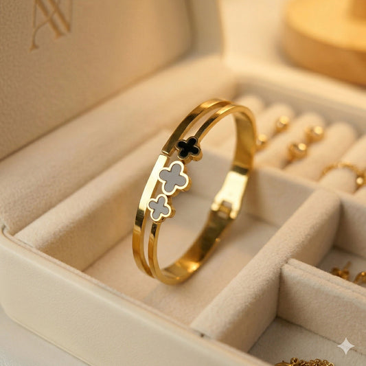 Stainless steel gold plated black four - leaf clover bangle - Stainless steel gold plated black four - leaf clover bangleJewelryGlow with NazGlow With NazN-B004Stainless steel gold plated black four - leaf clover bangle