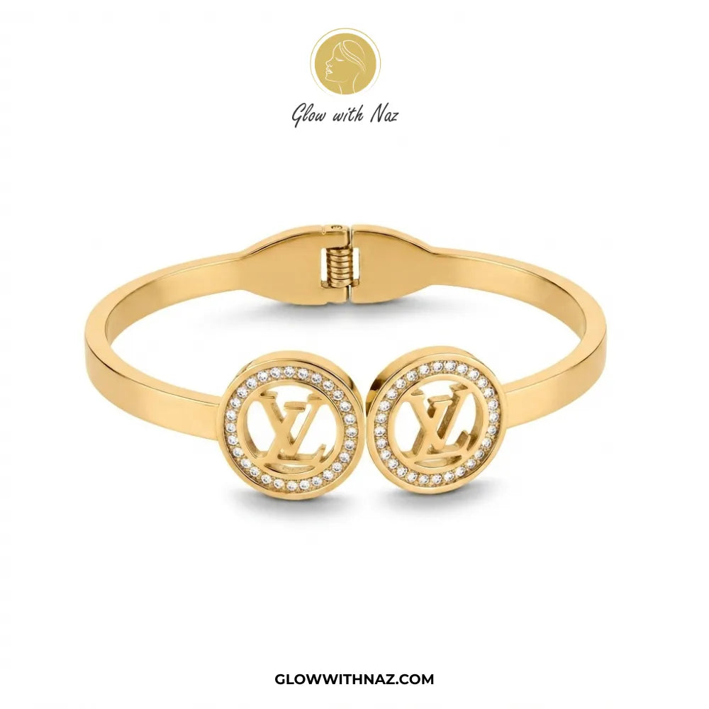 Gold dual monogram crystal halo handcuff bangle front view by Glow With Naz