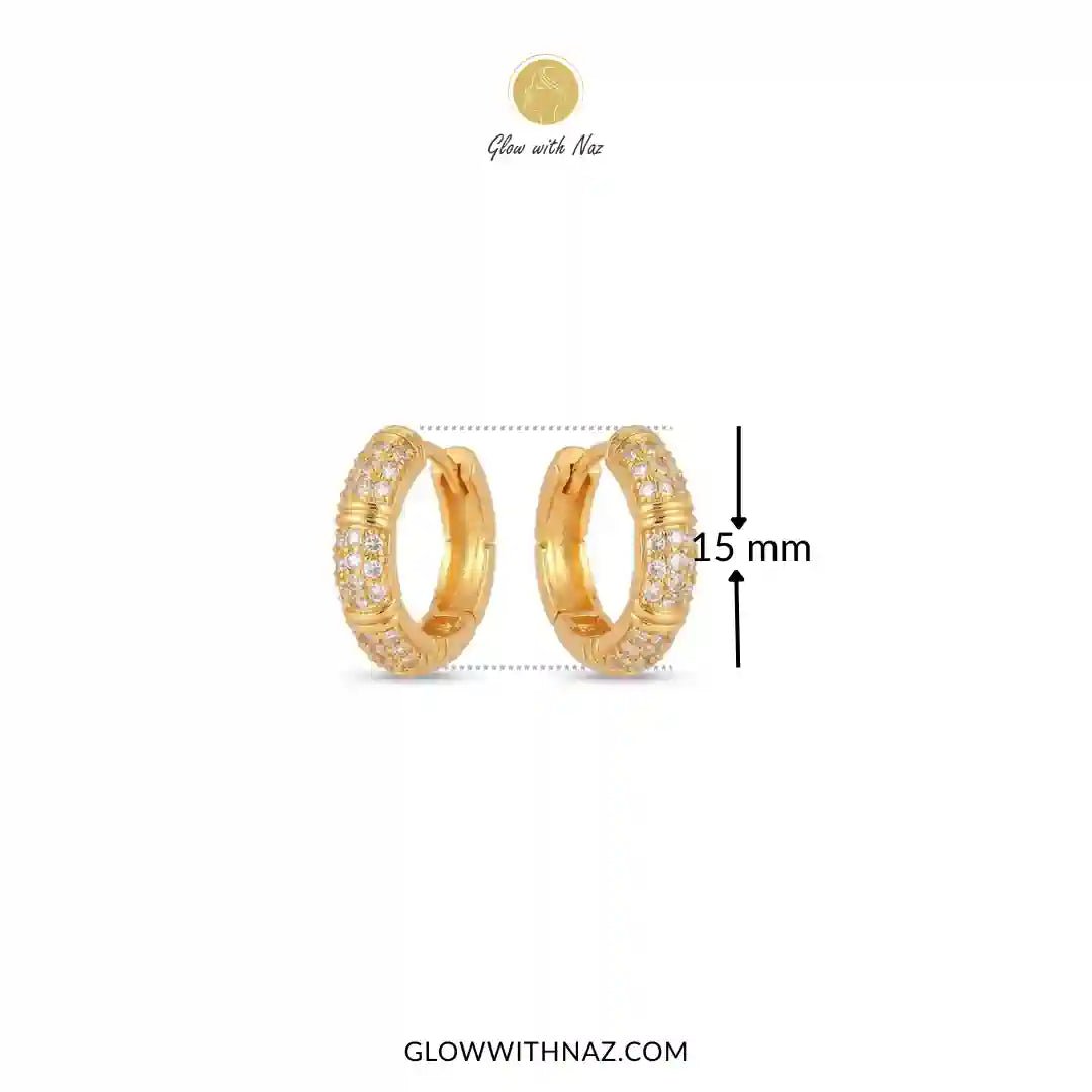 Zircon 3 Bar Mini Hoops Earrings - #Zircon 3 Bar Mini Hoops EarringsJewelryGlow With NazGlow With NazE057Gold huggie hoop earrings with pavé-set clear stones, shown on a white background with a 15 mm height measurement marker and Glow with Naz branding.#