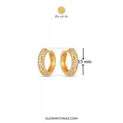 Zircon 3 Bar Mini Hoops Earrings - #Zircon 3 Bar Mini Hoops EarringsJewelryGlow With NazGlow With NazE057Gold huggie hoop earrings with pavé-set clear stones, shown on a white background with a 15 mm height measurement marker and Glow with Naz branding.#